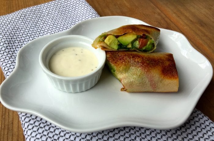 Recipe for low carb avocado spring rolls full of fresh ingredients.