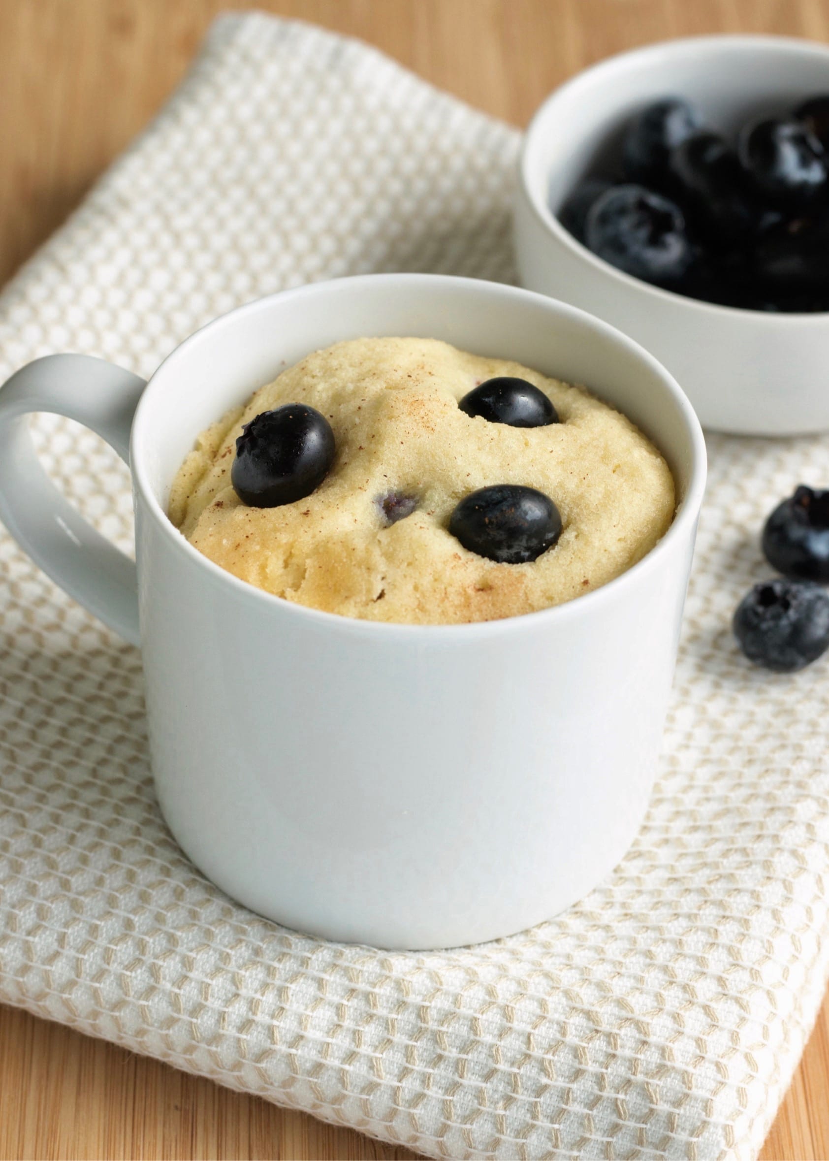 Keto blueberry muffin recipe that you make in a mug.