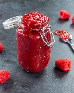 Recipe for making homemade keto friendly raspberry preserves with only 8 ingredients.