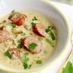 This creamy sauerkraut and sausage soup is an easy and flavorful recipe made with smokey polish sausage and briney sauerkraut.
