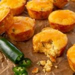 Recipe that makes spicy, cheesy, and flavorful  keto cornbread muffins.