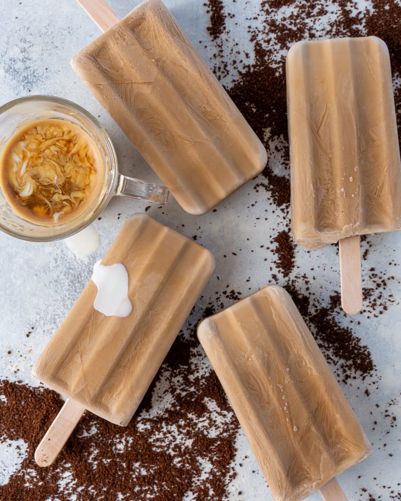 Simple recipe for creamy iced coffee popsicles.