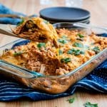 Have a hearty dinner on the table in just about 30 minutes with this easy chicken enchilada casserole recipe!
