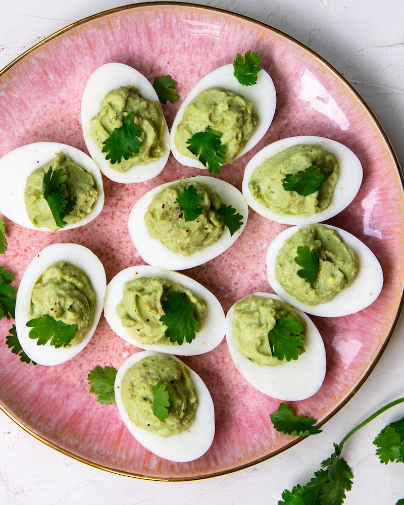 Recipe for avocado lime deviled eggs - a fun twist on traditional deviled eggs.